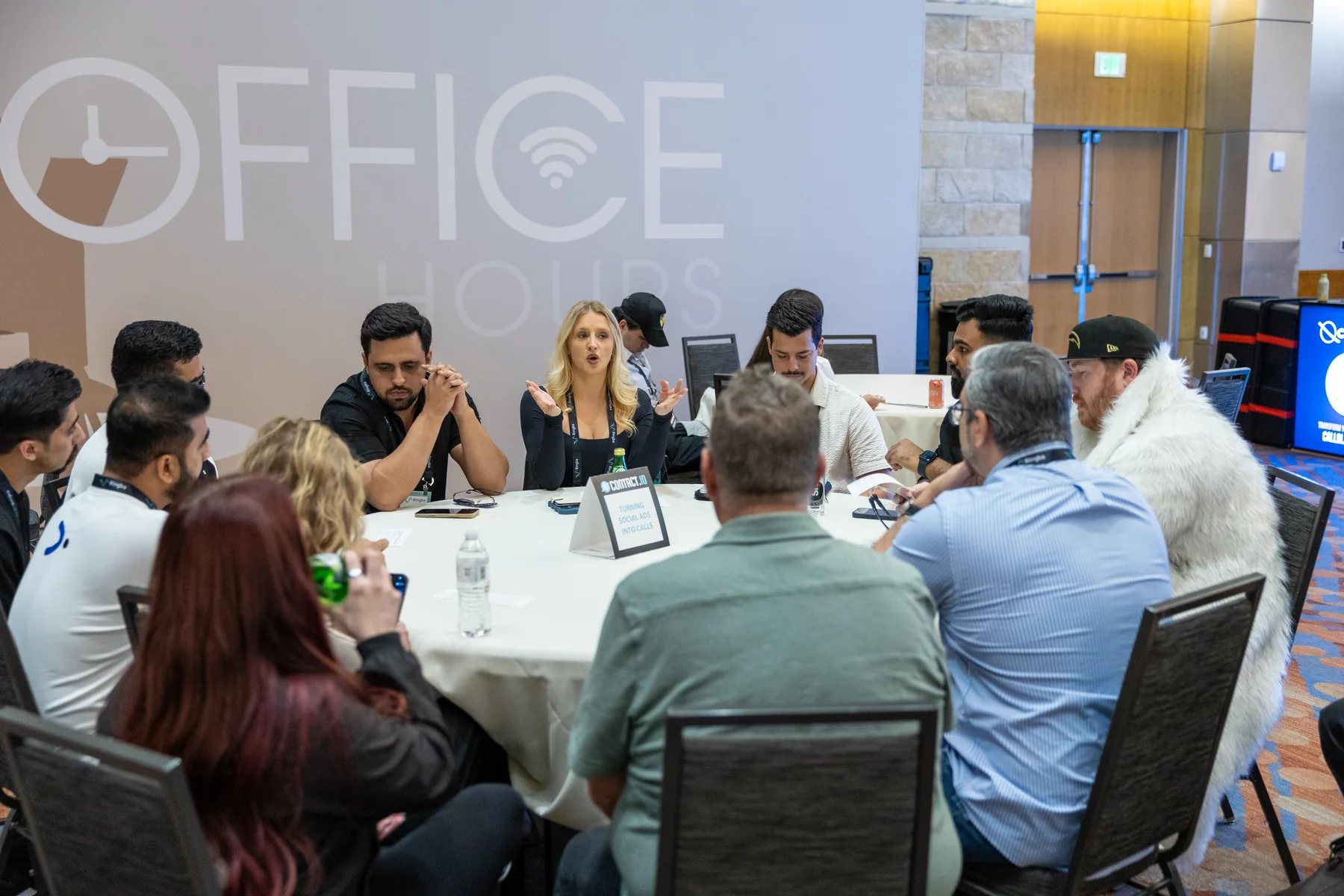 Contact.io 2026 attendees taking part in a roundtable discussion