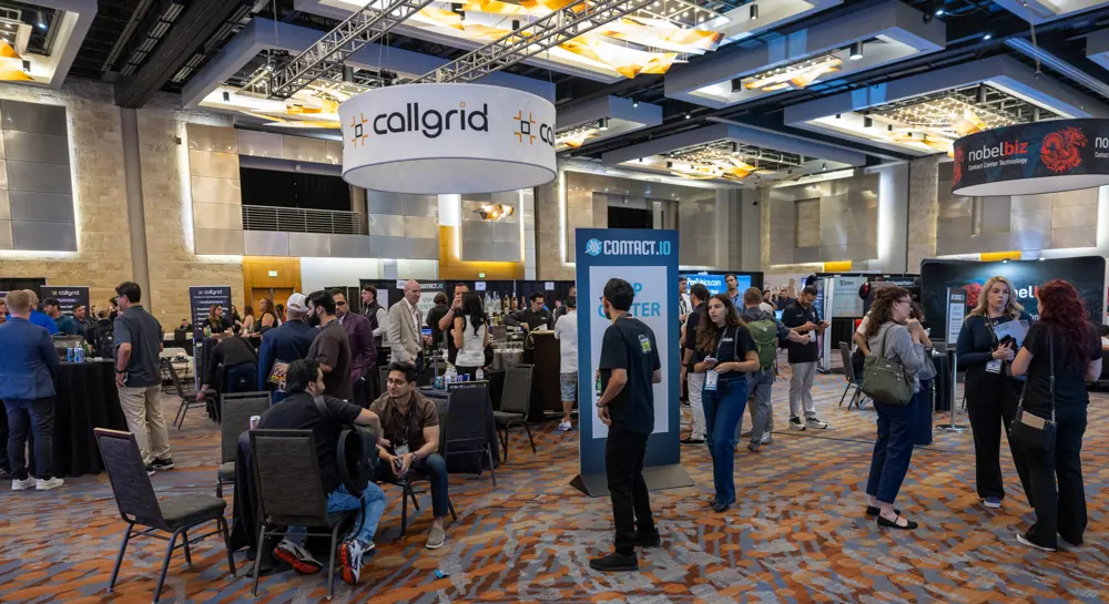 Attendees connecting on the Contact.io 2026 exhibit floor